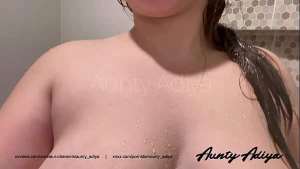 Chubby Indian Girl Filmed While Having Shower soaping her big tits and hairy pussy