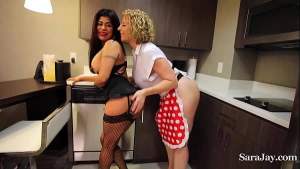Skirt chaser cougar Sara Jay has something special for sex doll Gabby Quinteros mouth in her kitchen, a fat strap on before she fucks her pussy in hot lingerie! Full Video & More Sara @ SaraJay.com!