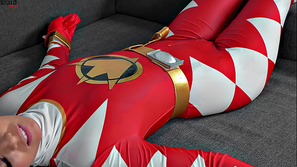 Hot brunette dominates over a Superhero girl