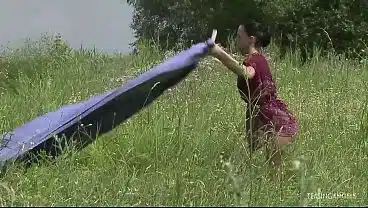Hot summer day. A couple is swimming in a nearby lake. The milf brunettes sexy body is twisting and turning while she is getting hammered from behind. She loves having anal sex by this small lake.