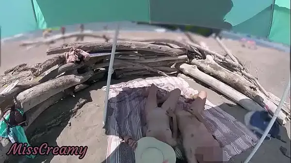 #2 Voyeur watching us while my hot wife masturbating and cumshot cock in nudist beach public – Risky Public Sex – Caught Handjob by stranger – MissCreamy